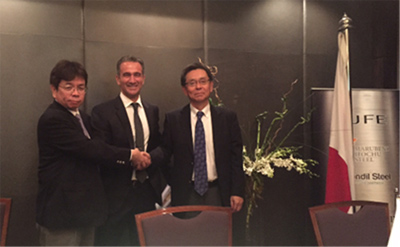 MISI Toshihiko Takahashi, Kandil President Amr Kandil and JFE Steel Vice President Manabu Umakoshi shaking hands